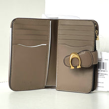 Load image into Gallery viewer, Brown wallet with gold clasp on a white background