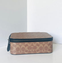 Load image into Gallery viewer, Cosmetic bag with a patterned design on a white background
