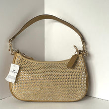 Load image into Gallery viewer, Beige handbag with rhinestone embellishments on a light background