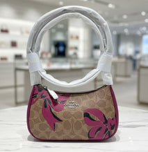 Load image into Gallery viewer, Handbag with floral design on a white background