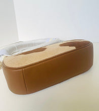 Load image into Gallery viewer, A brown leather and cowhide-textured shoulder bag shown on a plain light background.