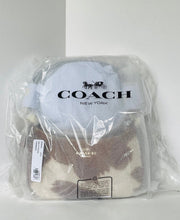 Load image into Gallery viewer, A Coach New York handbag in clear plastic packaging, showing a light blue leather top with the black Coach logo and a brown and cream patterned lower section.