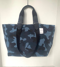 Load image into Gallery viewer, Blue camouflage tote bag with black straps on a white background