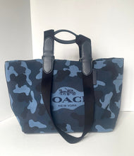 Load image into Gallery viewer, Blue camouflage tote bag with black handles on a white background