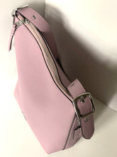 Load image into Gallery viewer, A dusty pink pebbled leather shoulder bag with silver-tone hardware, shown from an angled perspective against a plain off-white background.