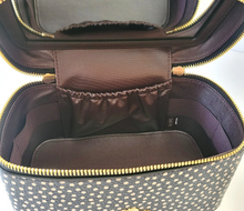 Load image into Gallery viewer, Open brown travel case with gold zipper on a white background