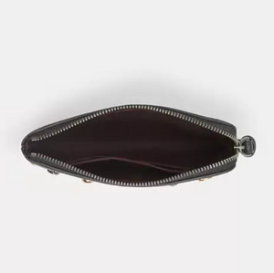 Black leather pouch with zipper on a white background