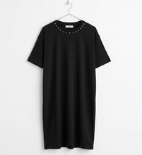 Load image into Gallery viewer, Black t-shirt with studded details on a white background