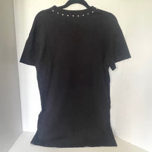 Load image into Gallery viewer, Black t-shirt with decorative studs on a white background