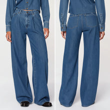 Load image into Gallery viewer, Two views of a person wearing wide-leg blue jeans on a white background