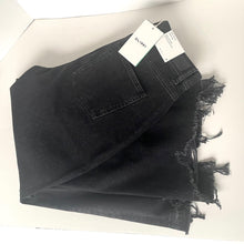 Load image into Gallery viewer, Black denim jacket with frayed hem on a white background