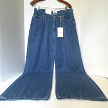 Load image into Gallery viewer, Blue jeans on a hanger with a white background