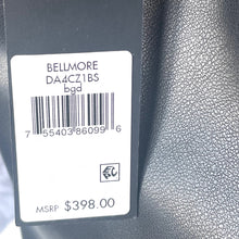 Load image into Gallery viewer, Product label with barcode and pricing information on a textured surface