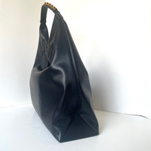 Load image into Gallery viewer, Black handbag on a white background