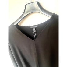 Load image into Gallery viewer, Dark gray dress on a hanger with 'Glen Fish' label.