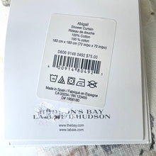 Load image into Gallery viewer, Label on a shower curtain with product details and Hudson's Bay branding.