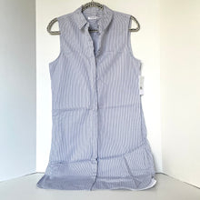 Load image into Gallery viewer, Blue and white striped sleeveless shirt on a hanger against a white background