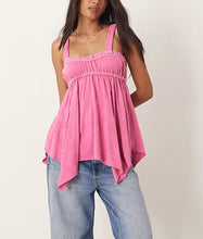 Load image into Gallery viewer, Woman wearing a pink top and blue jeans on a plain background