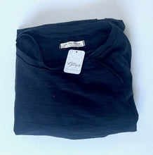 Load image into Gallery viewer, Folded navy blue shirt with tags on a white background