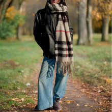 Load image into Gallery viewer, Person wearing a checkered scarf and standing next to a vending machine.