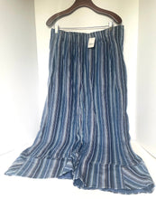 Load image into Gallery viewer, Blue and white striped skirt on a hanger against a white background