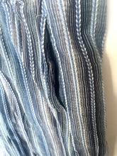 Load image into Gallery viewer, Close-up of blue and white striped fabric with a blurred background