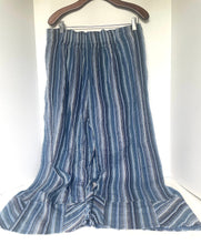 Load image into Gallery viewer, Blue and white striped pants on a hanger against a white background