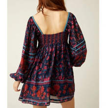 Load image into Gallery viewer, Floral dress with long sleeves on a plain background