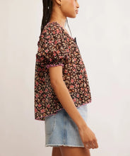 Load image into Gallery viewer, Person wearing a floral blouse and denim skirt on a plain background