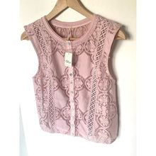 Load image into Gallery viewer, Pink lace top on a hanger against a white background