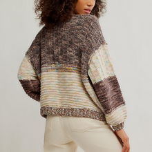 Load image into Gallery viewer, Person wearing a patterned sweater with a neutral background