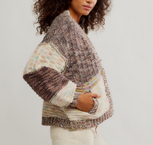 Load image into Gallery viewer, Person wearing a multicolored textured sweater on a plain background