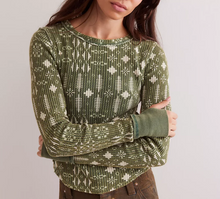 Load image into Gallery viewer, Person wearing a green patterned sweater against a plain background
