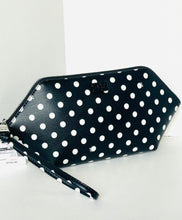 Load image into Gallery viewer, Black polka dot clutch bag on a white surface