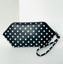 Load image into Gallery viewer, Black clutch with white polka dots on a white background