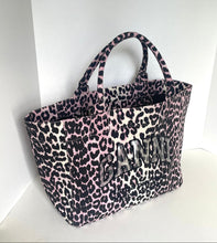 Load image into Gallery viewer, Leopard print tote bag with 'GUESS' branding on a white background