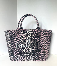 Load image into Gallery viewer, Leopard print tote bag with 'Ganni' branding on a white background