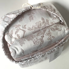 Load image into Gallery viewer, Folded fabric with floral pattern in a packaging box on a white background