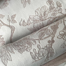 Load image into Gallery viewer, Roll of wallpaper with floral and leaf pattern on a neutral background