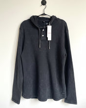 Load image into Gallery viewer, Gray hoodie with a tag on a white background