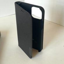 Load image into Gallery viewer, Black phone case on a light surface