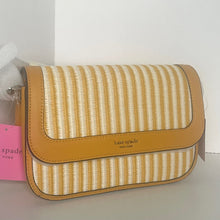 Load image into Gallery viewer, Yellow and white striped handbag with 'Spade' branding on a light background