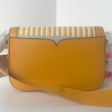 Load image into Gallery viewer, Yellow crossbody bag with a strap on a white background