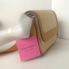 Load image into Gallery viewer, Beige handbag with a pink 'kate spade New York' tag on a white background