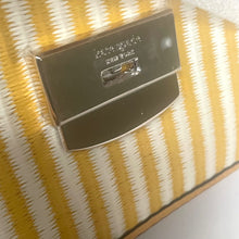 Load image into Gallery viewer, Close-up of a yellow and white striped fabric with a metal label.