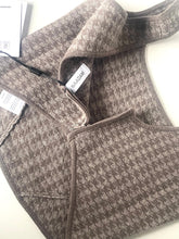Load image into Gallery viewer, Gray textured fabric with a pattern on a white background