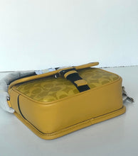 Load image into Gallery viewer, Yellow patterned bag with a strap on a white background