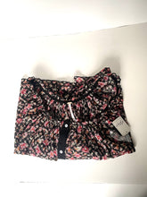 Load image into Gallery viewer, Floral patterned shirt with buttons on a white background