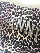 Load image into Gallery viewer, Leopard print fabric with 'Ganni' branding on a white background