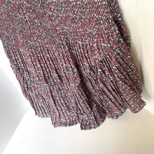 Load image into Gallery viewer, Close-up of pleated fabric with a floral pattern on a white background
